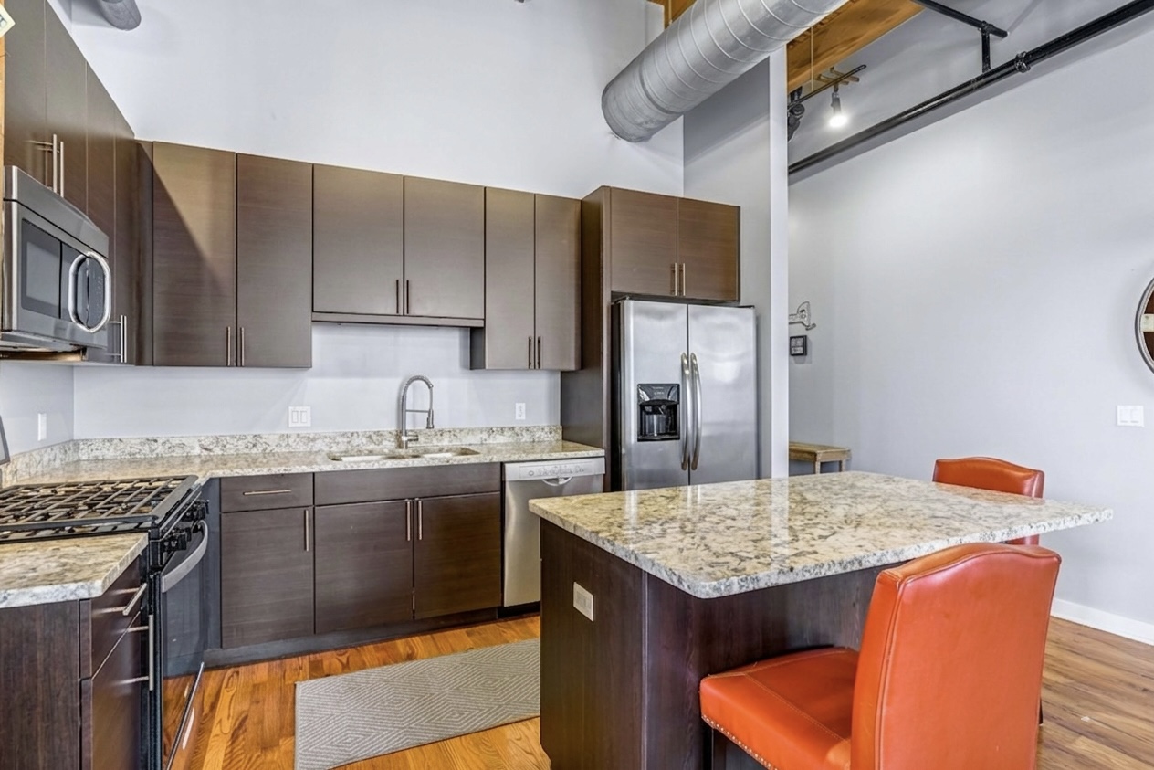 Kitchen — stainless appliances & granite counters