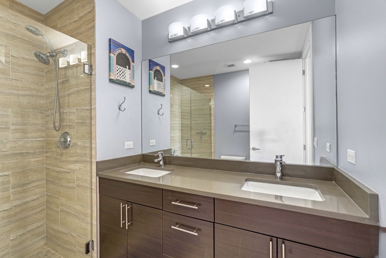 Primary bath — double vanity & walk-in shower